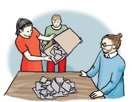 Drei Personen zählen gemeinsam Wahlzettel auf einem Tisch